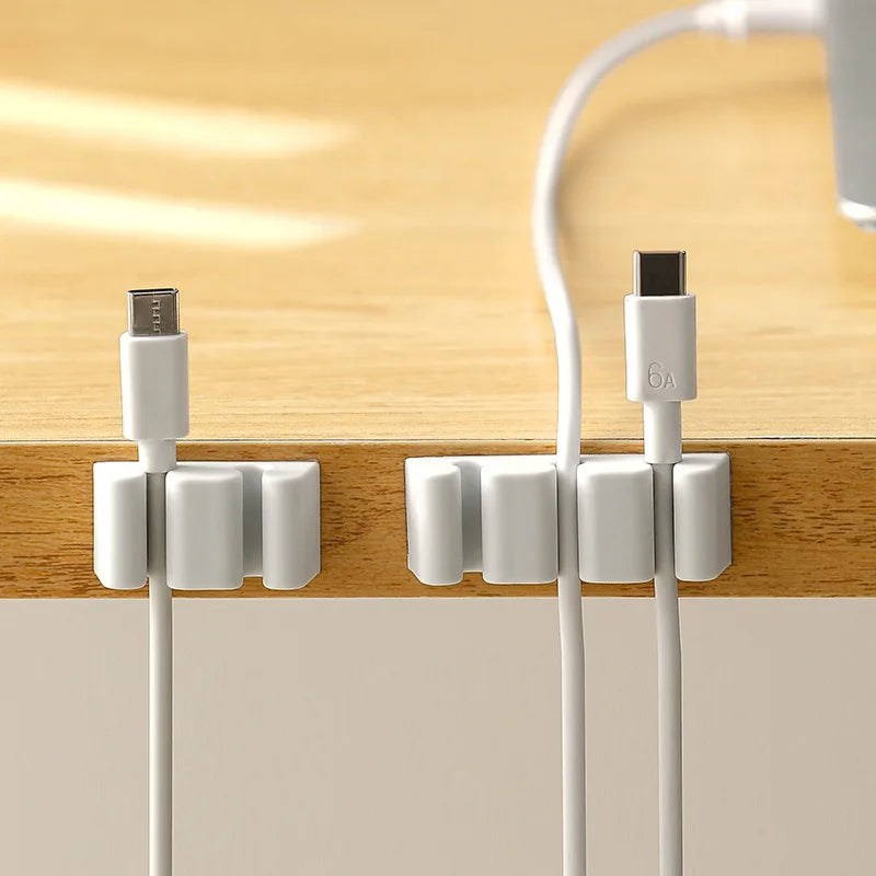 📋 Title:
Desktop Cable Organizer Silicone Cable Holder Clips Cord Wire Management Self Adhesive USB Cable Winder for Home Office (2 PCS)