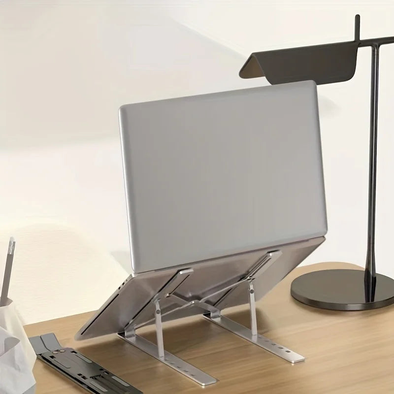 Adjustable Foldable Laptop Stand – Portable Desktop Riser with Heat Dissipation for Work & Travel
